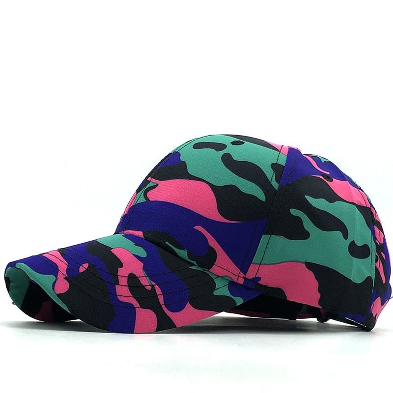 A BlasterMaster Camo Snapbacks with a colorful tactical camouflage design featuring pink, teal, blue, and black patches, perfect for outdoor adventures.