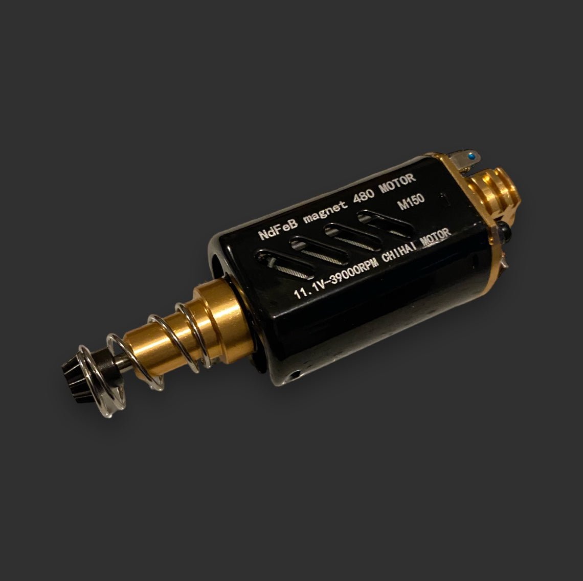 Close-up of a gold and black high-performance BlasterMasters CHIHAI MOTOR 11.1V-39000RPM M150 with specifications inscribed on it. The motor, featuring a Neodymium magnet, appears to have a cylindrical shaft attached. This powerful unit can reach speeds of up to 39,000 RPM.