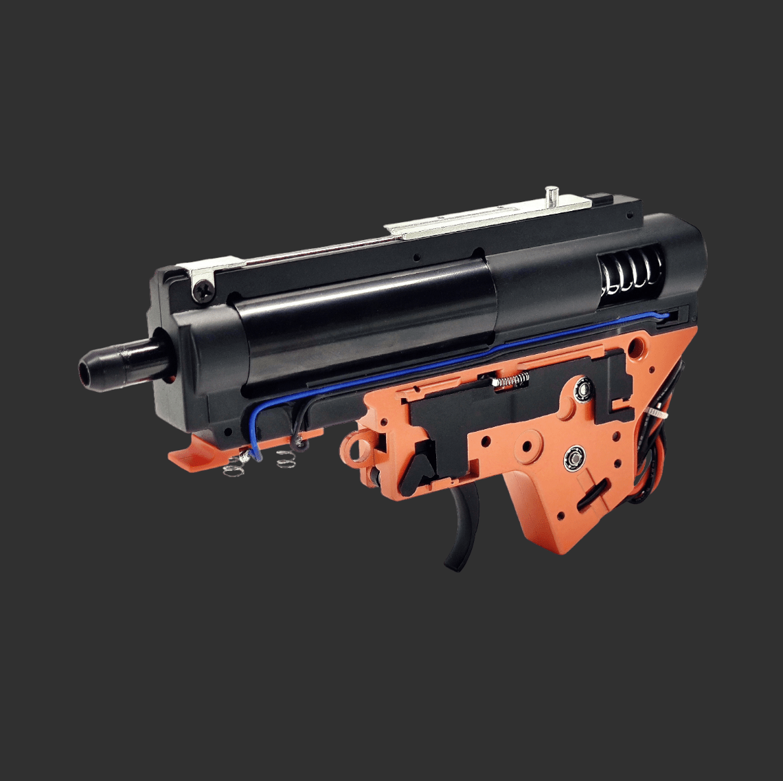 A close-up view of a GSL Jingji GSL Metal Gearbox V2 for SR16 & HK416D assembly with orange and black colored components against a dark background.