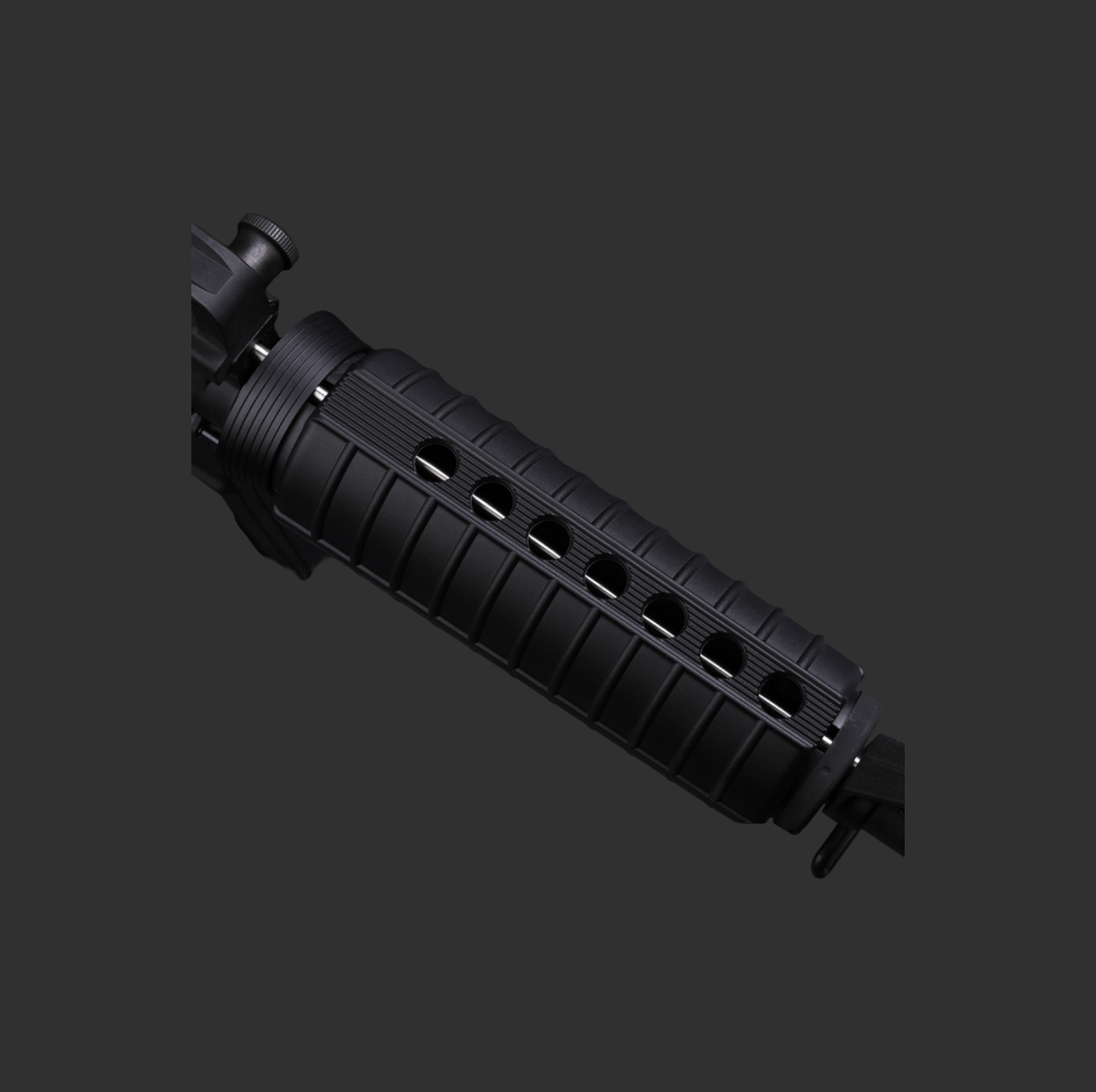 Close-up of the Kublai M4-Style Gel Blaster's black handguard, showcasing its ribbed texture with multiple oval ventilation holes, reflecting authentic M4 design and superior tactical engineering.