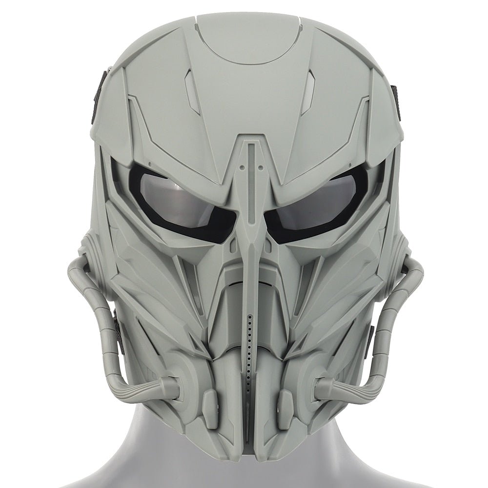 A close-up of a gray, BlasterMaster PREDATOR MASKS with dark tinted visor and intricate mechanical detail, featuring tubes on either side extending from the jaw area. This advanced protection helmet boasts durable construction for ultimate defense.