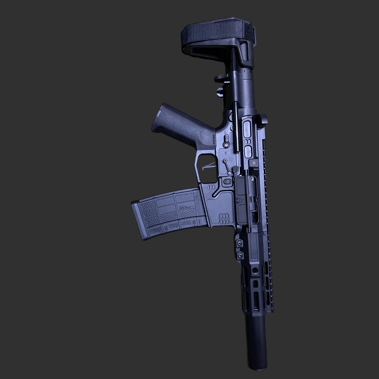 A black semi-automatic rifle with a pistol grip, adjustable stock, and an attached magazine set against a dark background, offering tactical flexibility synonymous with the SLR Gen 4 Gel Blaster by Jingli.