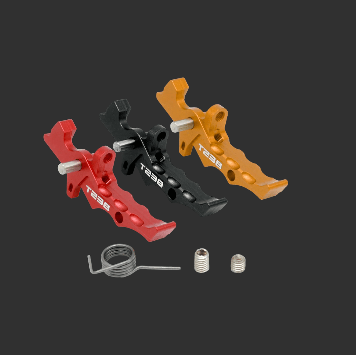 Three T238 Trigger by BlasterMasters in red, black, and gold with two coiled springs and two set screws on a dark background, suitable for T238 ETU or V2 Gearbox.